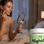 Woman applying night gel for glowing skin before bed.